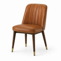 Chaise rembourrée rétro 54 × 61 × 84 cm, aspect cuir cognac, pieds brun foncé avec embouts dorés